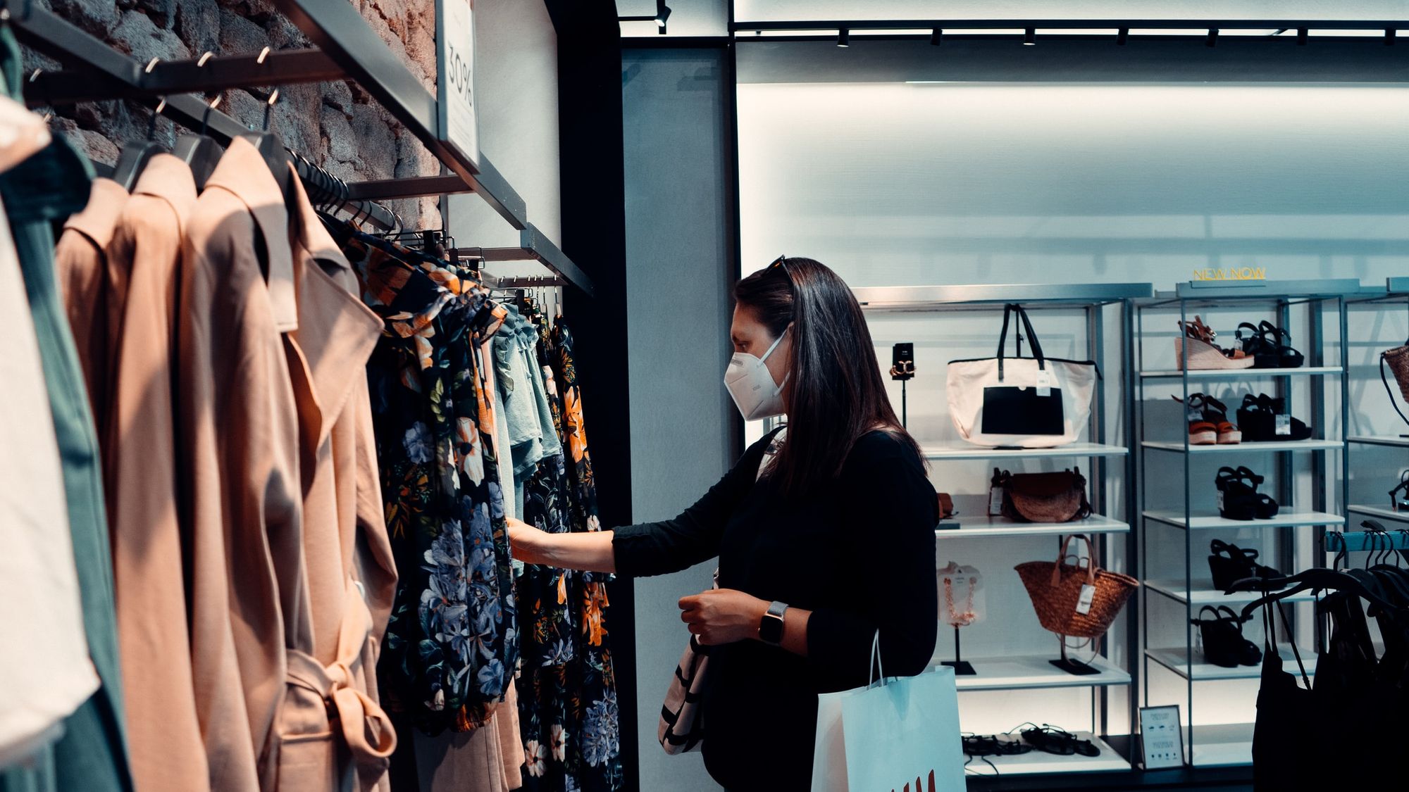 A woman shopping for garments during COVID-19 outbreak.