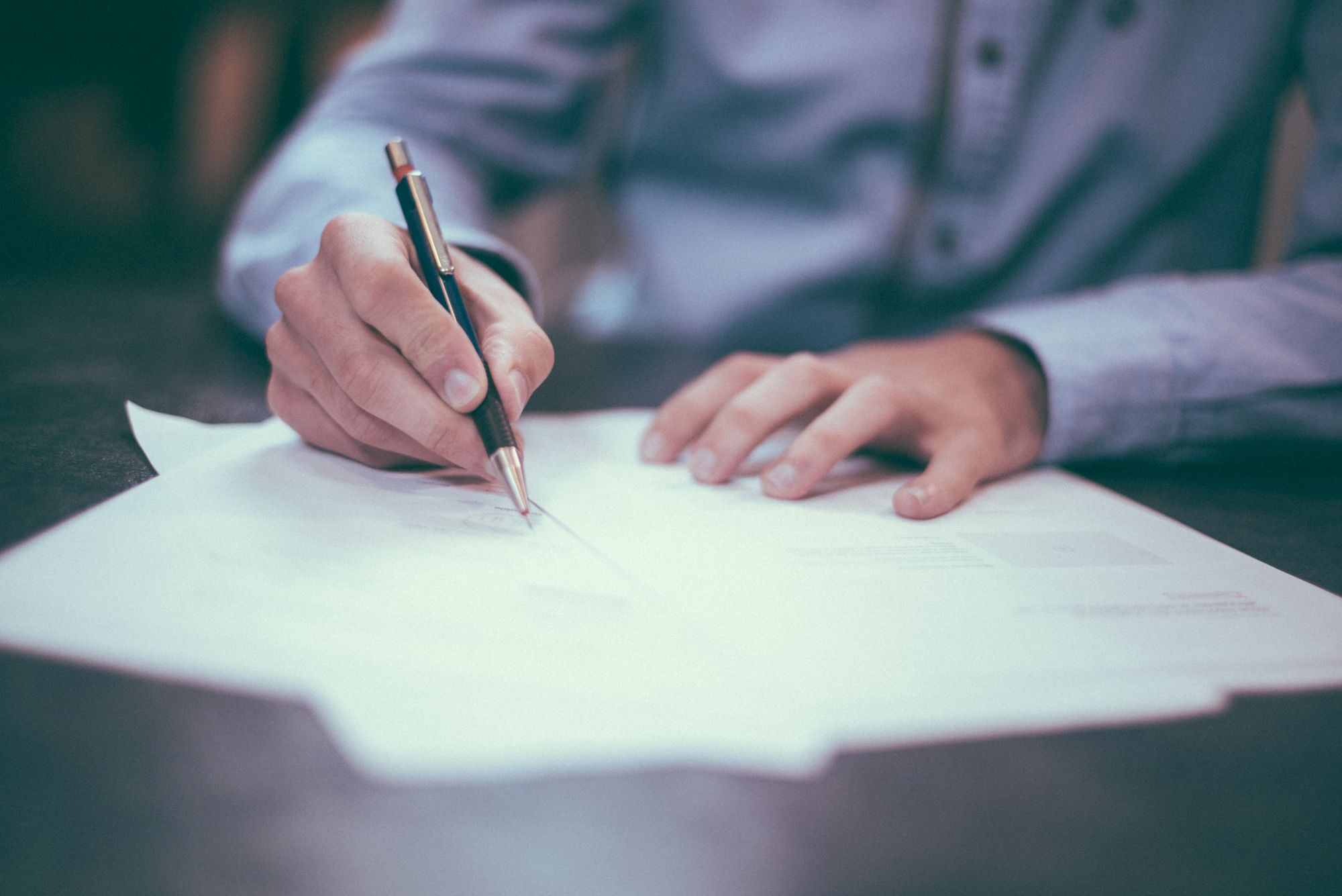 A finance officer preparing the annual income statement.