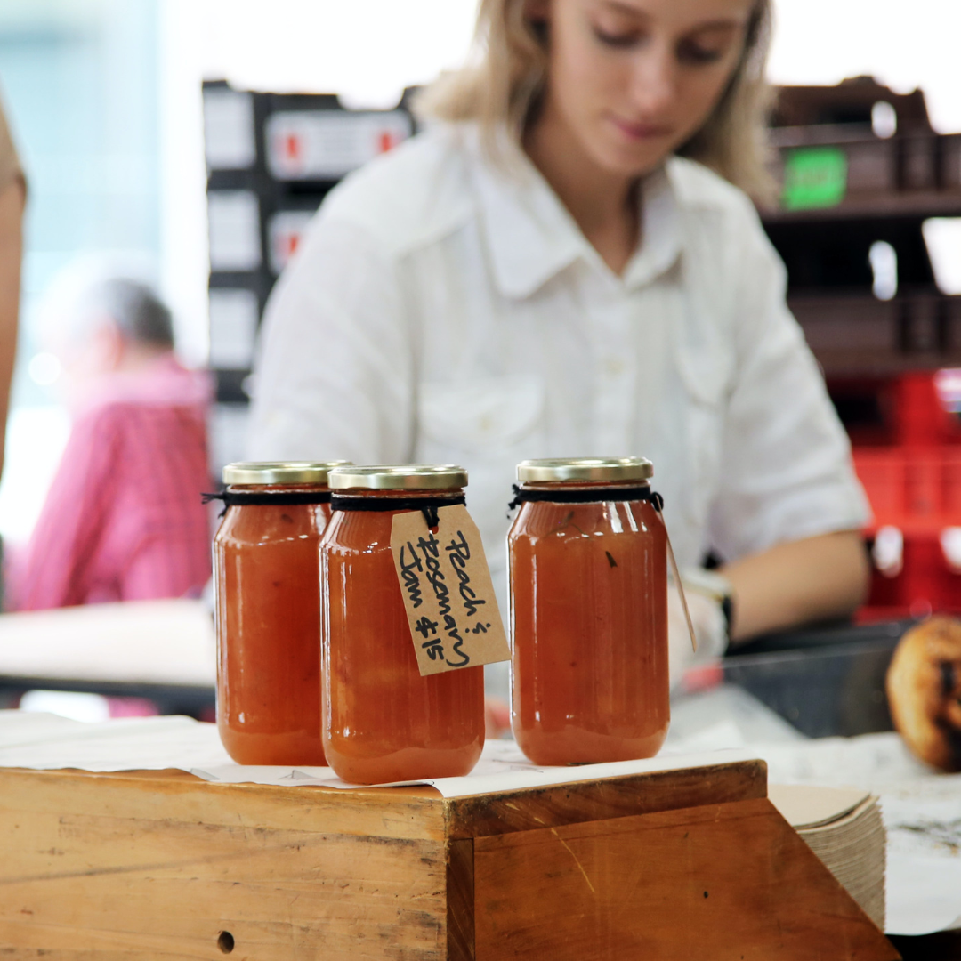 store selling peach  rosemary jam jars with $15 tag