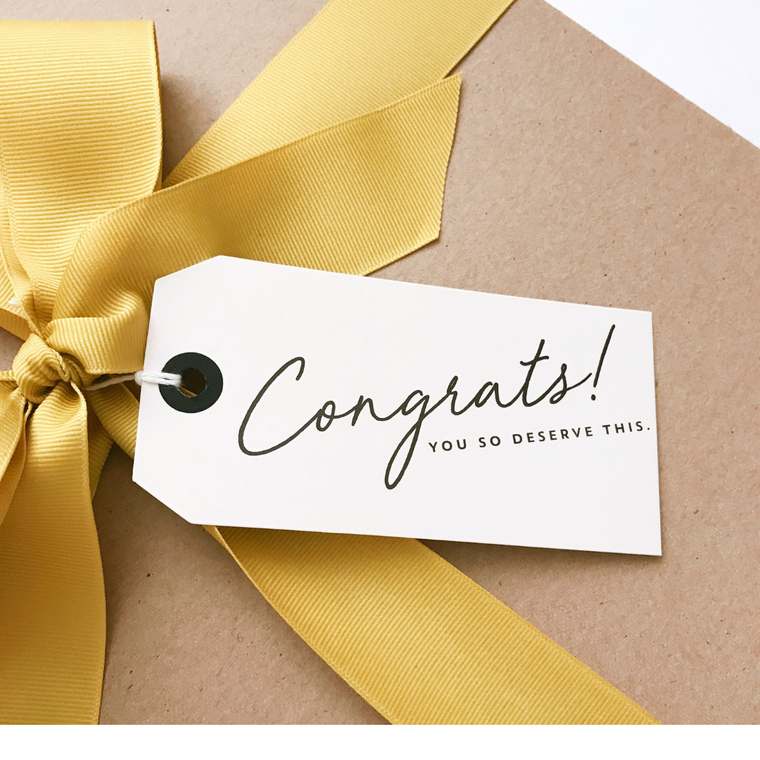 Gift box tagged with congrats message