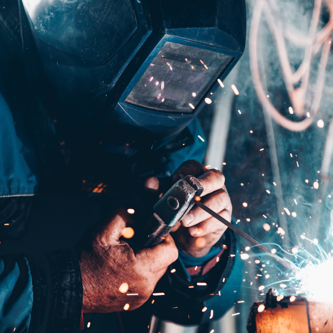 A worker in a welding unit