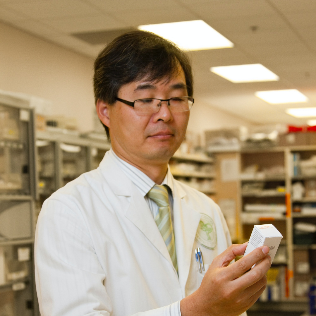 pharmacist checking a medicine pack